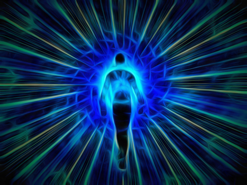 an outline of a person surrounded by blue light and rays of blue and green light radiating out from them.